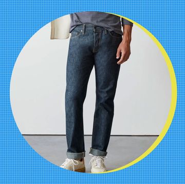 a person's legs and a blue circle with a yellow circle