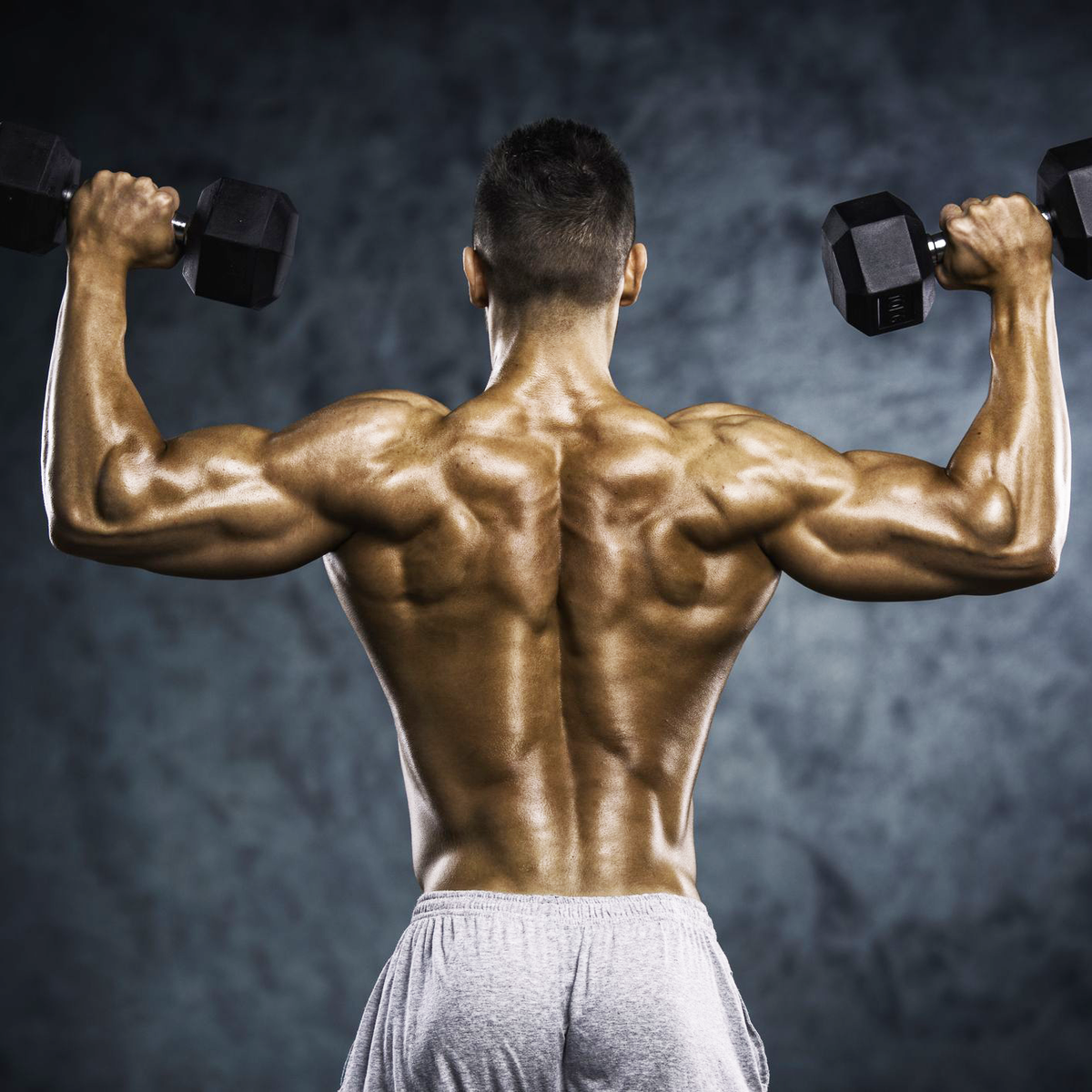 Strong back. Фитнес спина мужская. Бодибилдинг спина. Мышцы спины фото. Мужчина с гантелями.