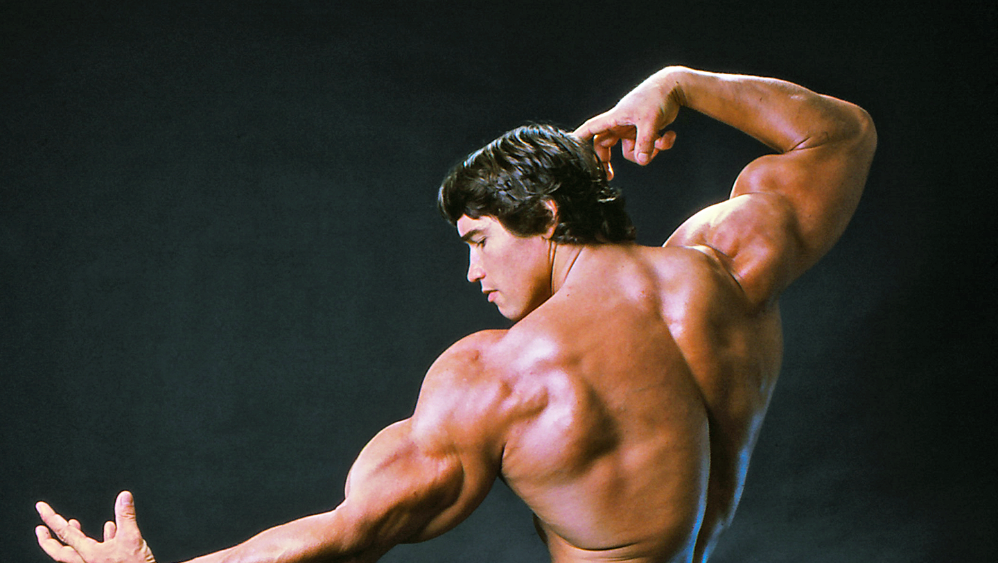 Arnold Schwarzenegger's Vacuum Pose - Muscle & Fitness