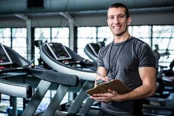 Male personal trainer at gym