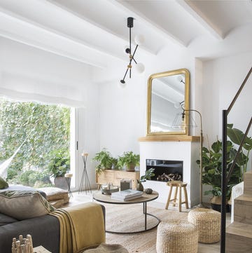 Casa Premia reformada: salón con chimenea casa premia reformada salón con chimenea