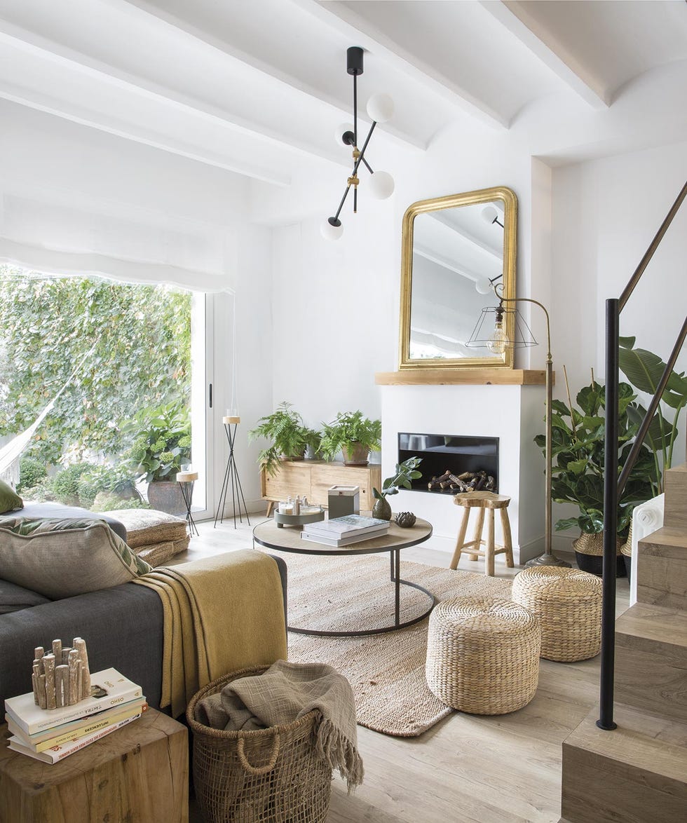 casa premia reformada salón con chimenea