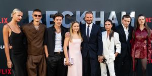 david and victoria beckham and their family posing for a photo at the beckham netflix premiere