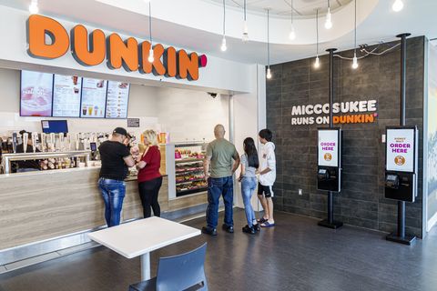 miccosukee indian reservation, florida everglades, service plaza, dunkin' donuts customers using touch screen kiosk