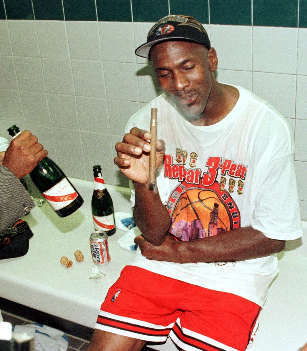 News Photo : Michael Jordan of the Chicago Bulls looks on