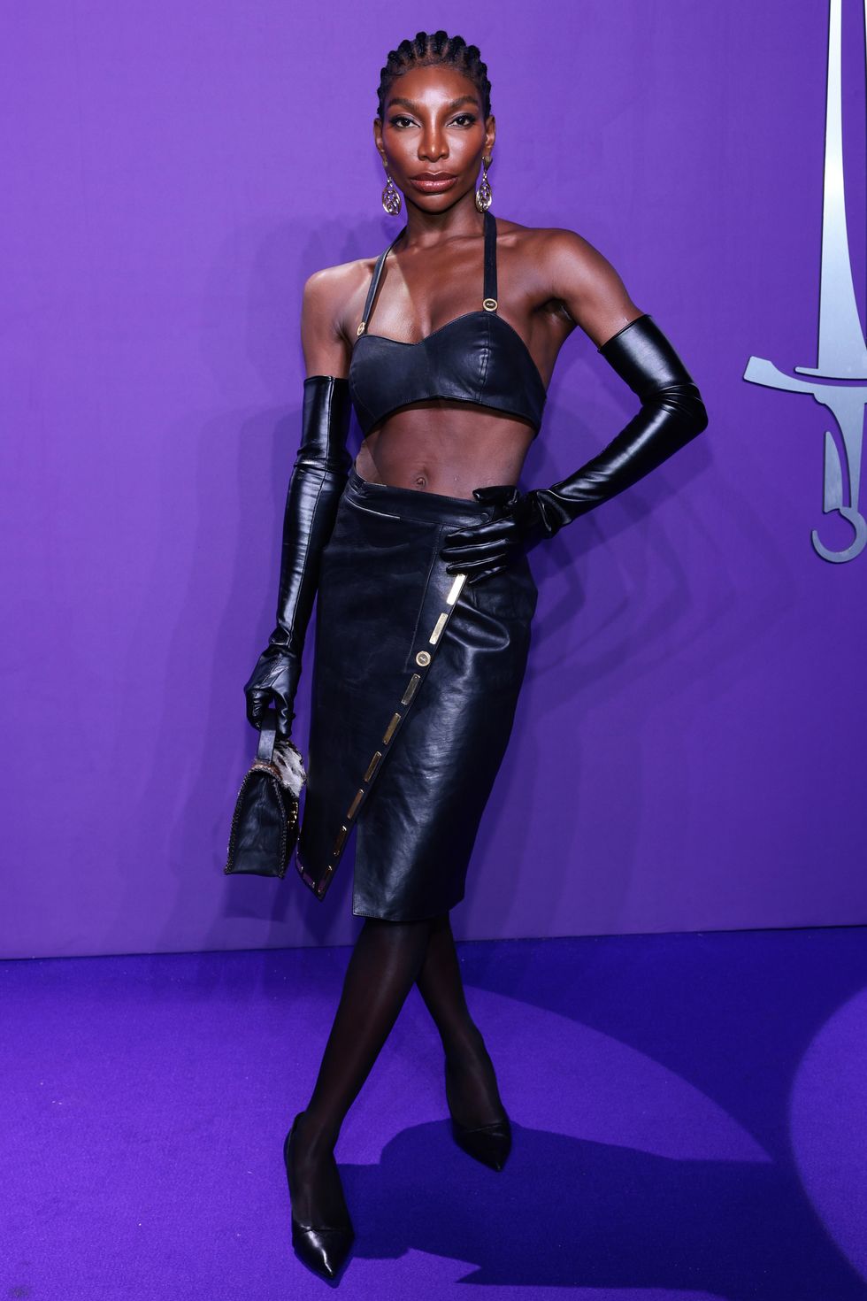 michaela coel in a leather bra top and midi skirt at the 2024 gq creativity awards