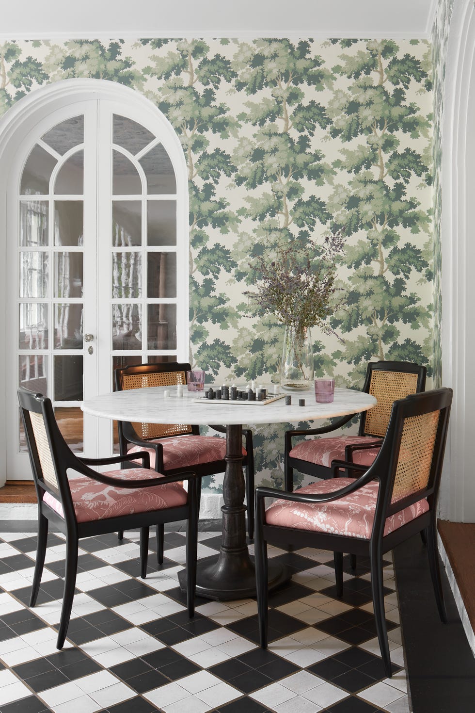 dining corner with pink chairs and marble table