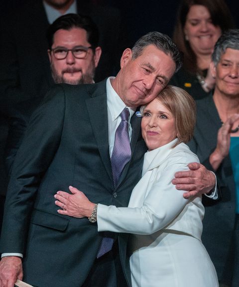 new mexico governor michelle lujan grisham hugs her fiance manny cordova