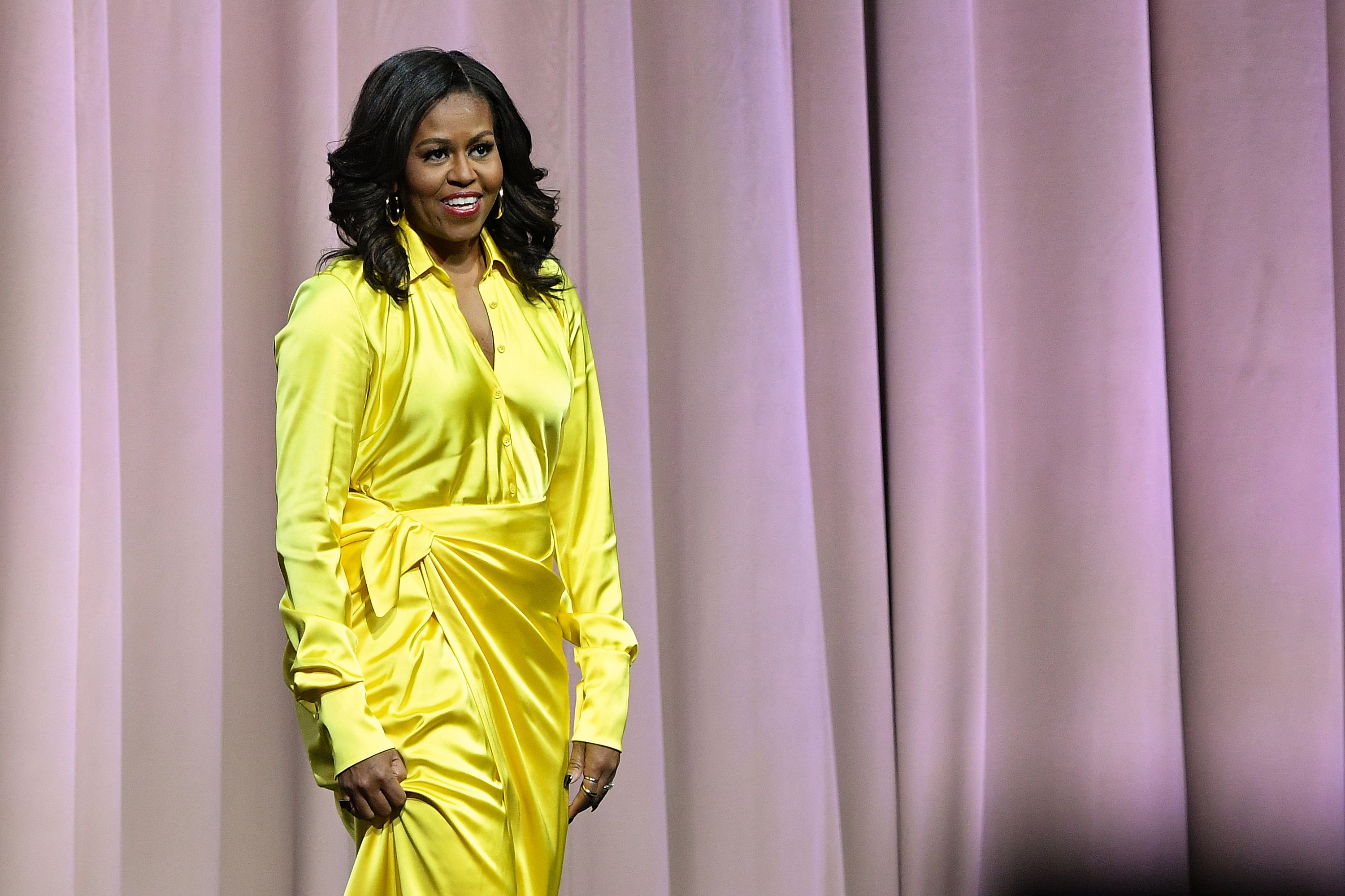 blæse hul Stolthed Rute Michelle Obama wore thigh-high Balenciaga boots