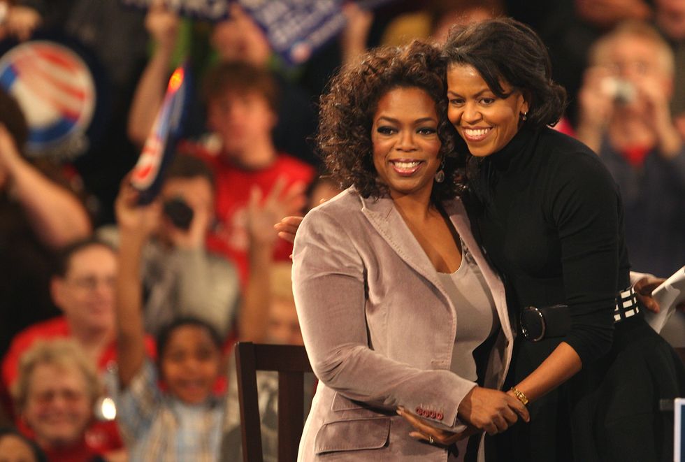 Oprah Winfrey and Michelle hug it out as they campaign for Obama in Des Moines, Iowa, in 2007.