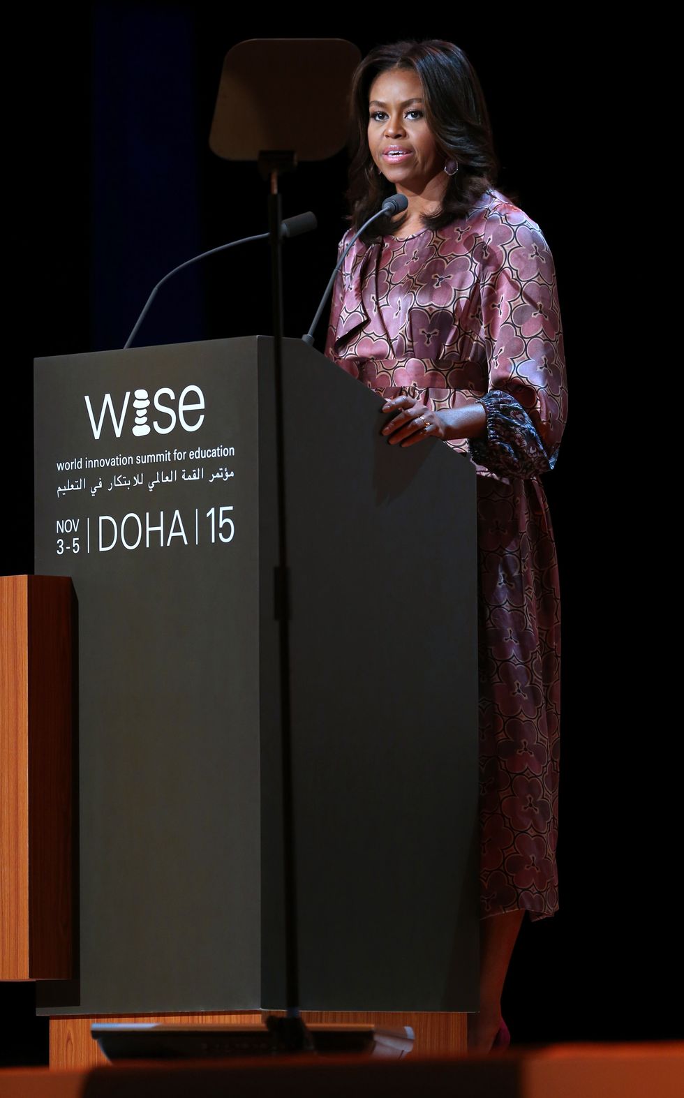 us first lady michelle obama delivers a speech during the world innovation summit for education wise held the convention center in the qatari capital doha on november 4, 2015 the us first lady, on a seven day tour of the middle east, told the education conference that an honest conversation was needed around the globe about how women were treated and how this prevented millions of girls from finishing school afp photo  faisal al tamimi photo credit should read faisal al tamimiafp via getty images