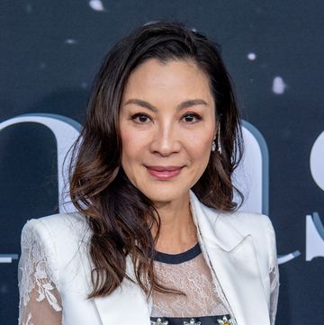 michelle yeoh poses on the red carpet at the last christmas premiere