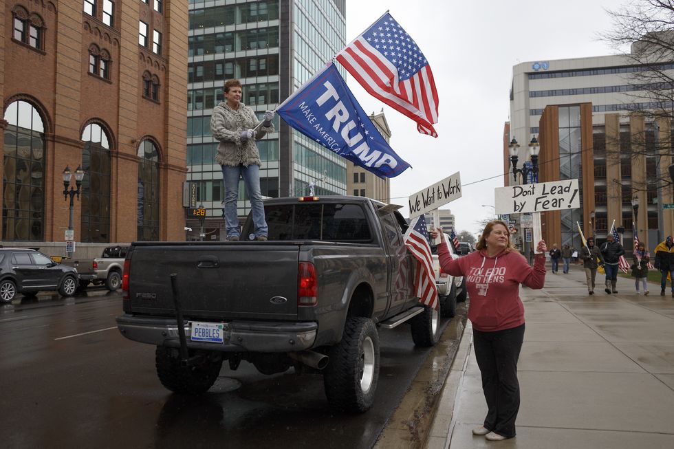 Michigan Conservative Coalition Holds Vehicle Rally Calling For Opening Of State's Economy