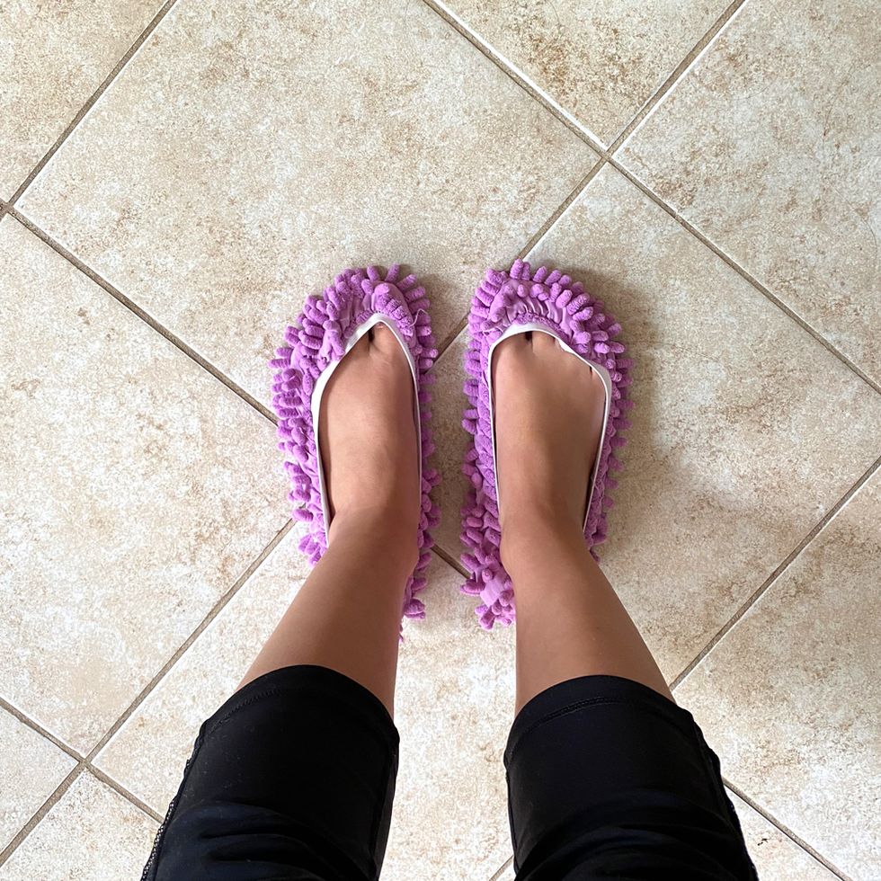 purple mop slippers on tile floor