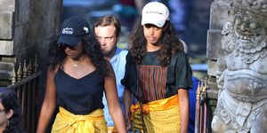 bali, indonesia june 27 sasha centre l and malia centre r, daughters of former us president barack obama, visit tirtha empul temple at tampaksiring village in gianyar on the indonesian resort island of bali on june 27, 2017 barack obama kicked off a 10 day family holiday in indonesia that will take in bali and jakarta, the city where he spent part of his childhood, officials said on june 24 photo by jepayona delitaanadolu agencygetty images