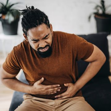 mid adult man having a stomachache