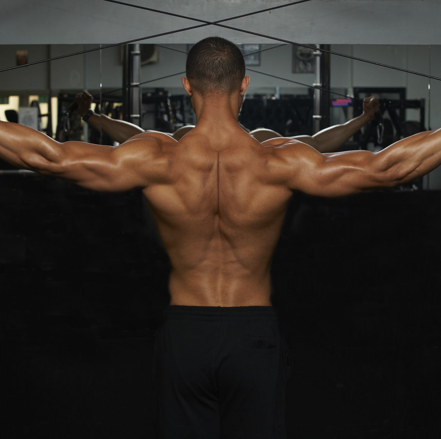 The Biggest Reasons Your Lats Aren't Growing, According to a Top Trainer