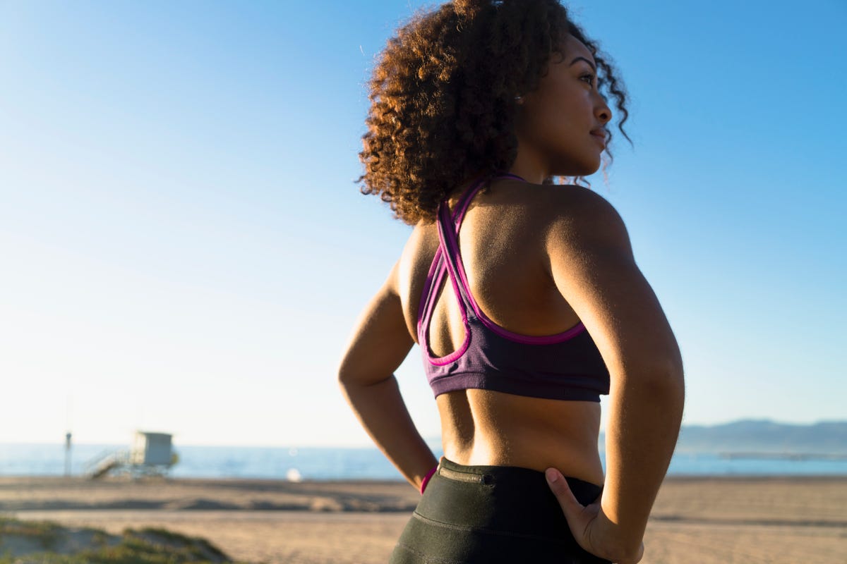 Strong back. Half-length image of beautiful sportive female back