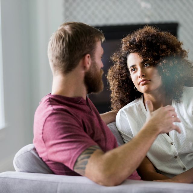 mid adult woman listens seriously to husband's ideas