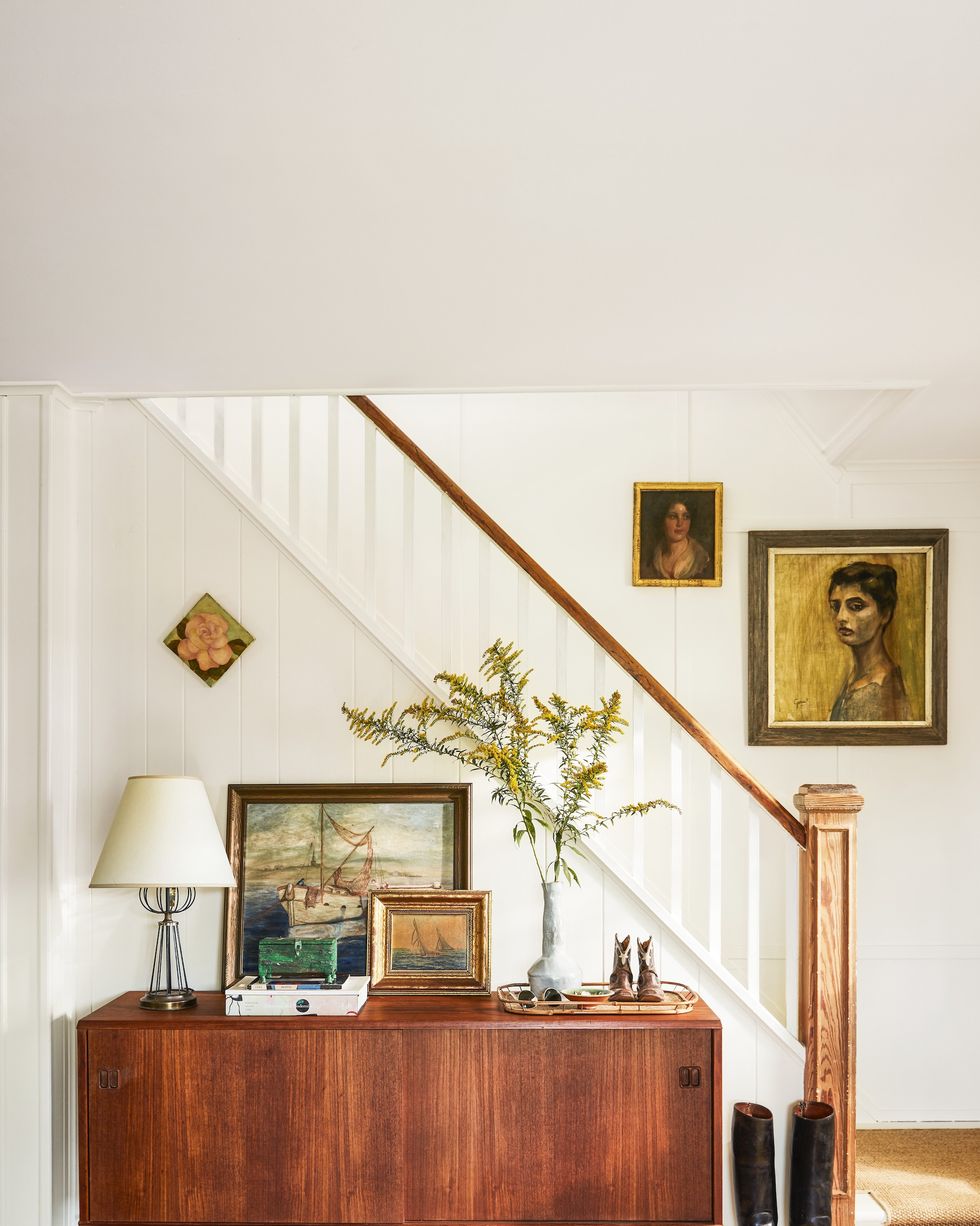 modern farmhouse entry with midcentury credenza