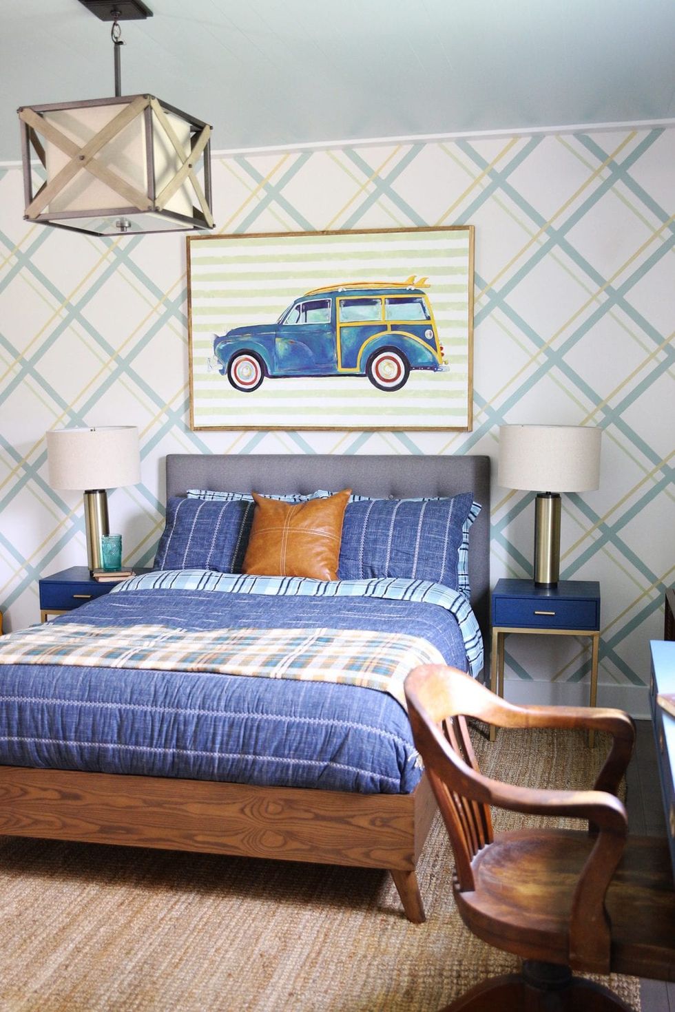 teen boy bedroom with blue stripe accent wall