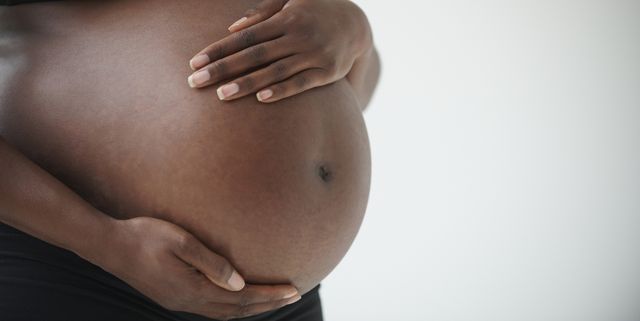 mujer embarazada tripa