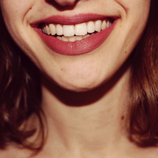 Midsection Of Smiling Woman