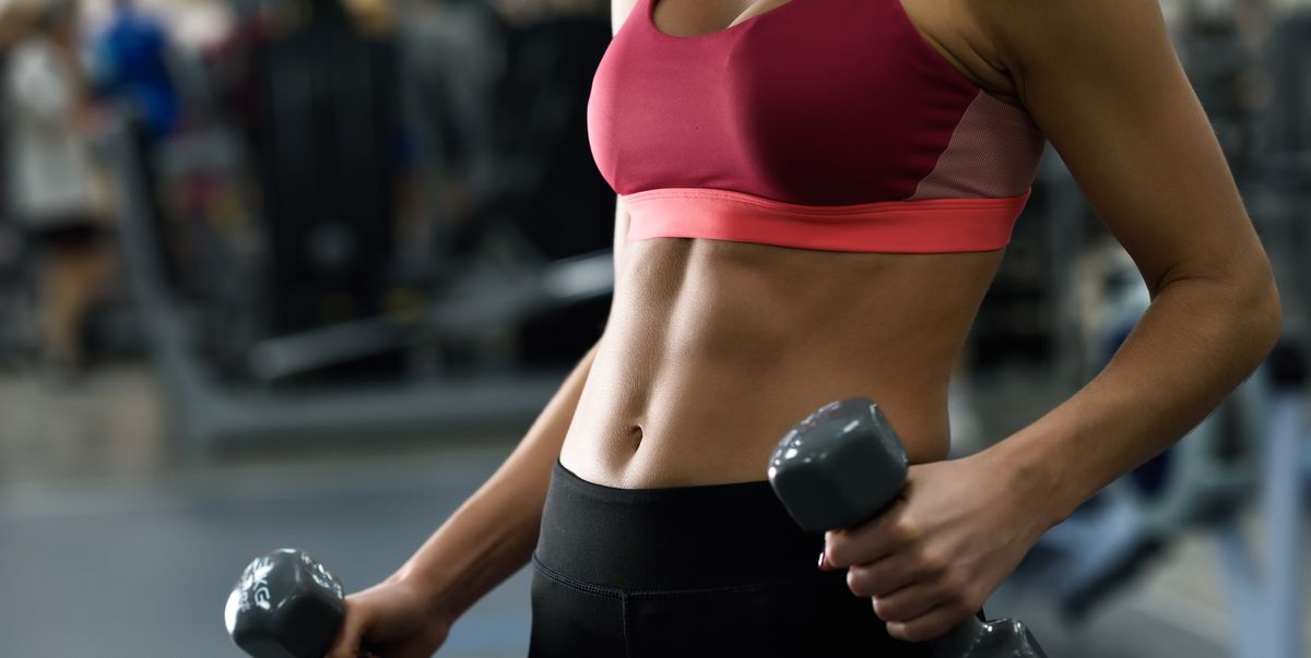 https://hips.hearstapps.com/hmg-prod/images/midsection-of-woman-exercising-in-gym-royalty-free-image-962270570-1553600443.jpg?crop=1.00xw:0.753xh;0,0.125xh&resize=1200:*