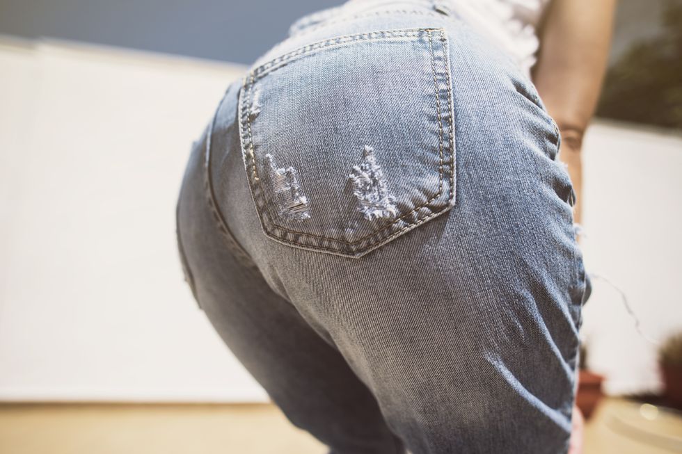 midsection of woman wearing jeans