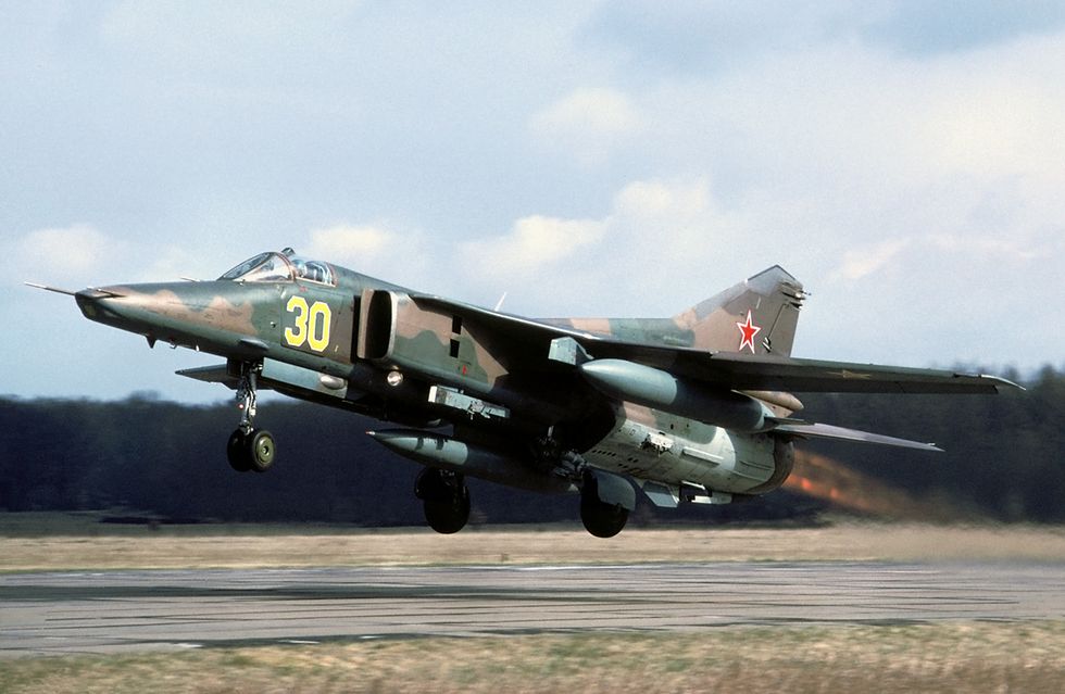 a fighter jet taking off mig27