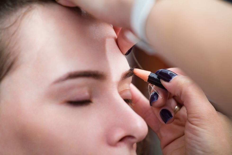 mikrobleyding eyebrows workflow in a beauty salon selective focus and shallow depth of field
