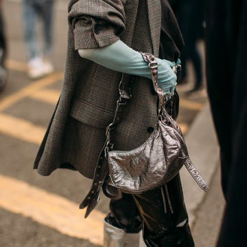 a person carrying a bag