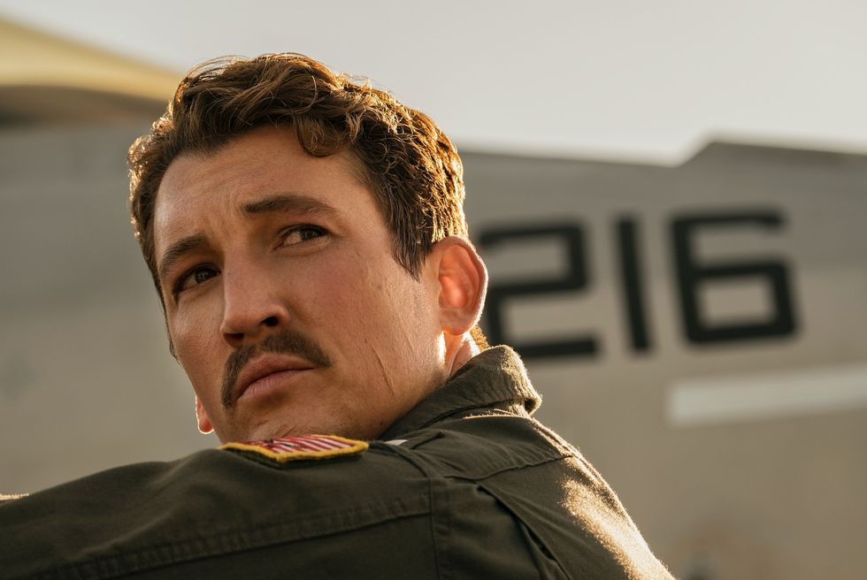 miles teller plays lt bradley "rooster" bradshaw in top gun maverick from paramount pictures