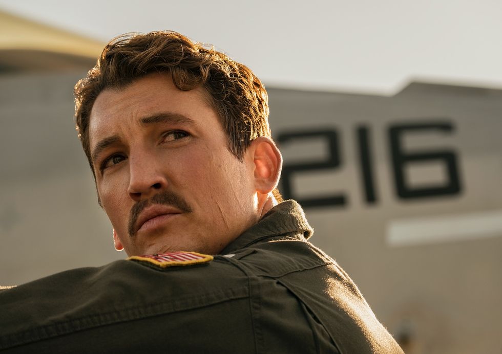 miles teller plays lt bradley "rooster" bradshaw in top gun maverick from paramount pictures