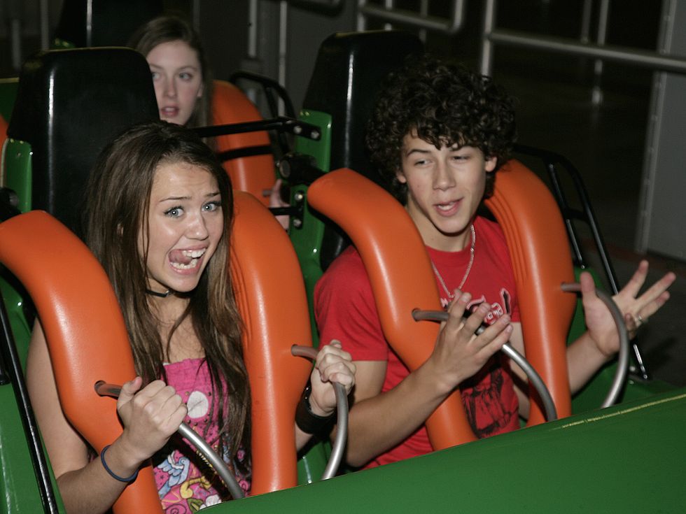 miley cyrus and the jonas brothers visit six flags magic mountain