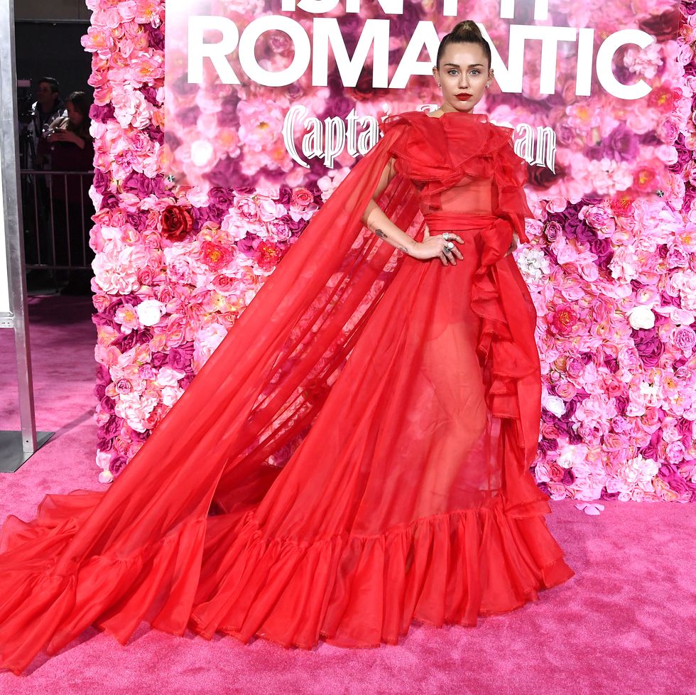 Miley Cyrus Wears Red Valentino Naked Dress to Isn't It Romantic ...