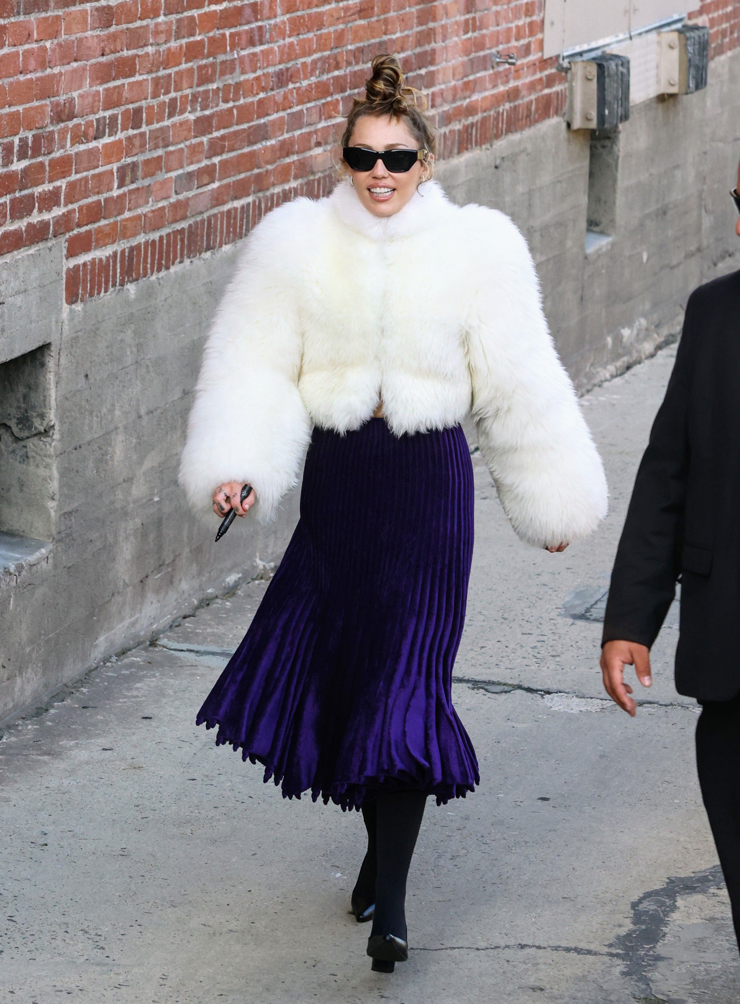 Miley Cyrus Is a Glamorous Puff Ball in This Creamy Fur Coat