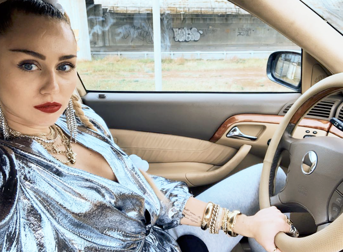 Miley Cyrus Wears New $995 Louis Vuitton Wireless Headphones in