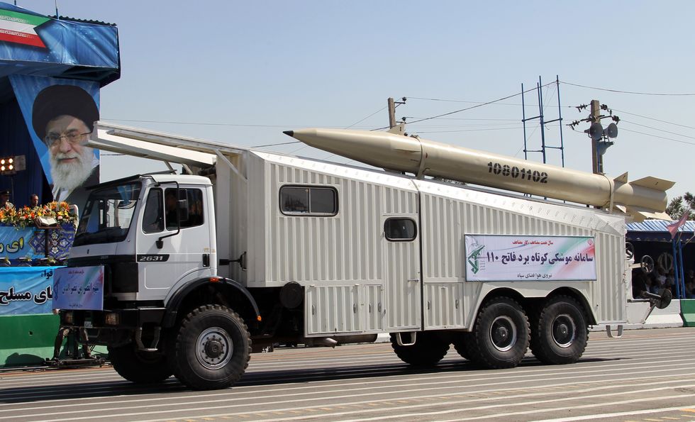 a military truck parades the fateh 110