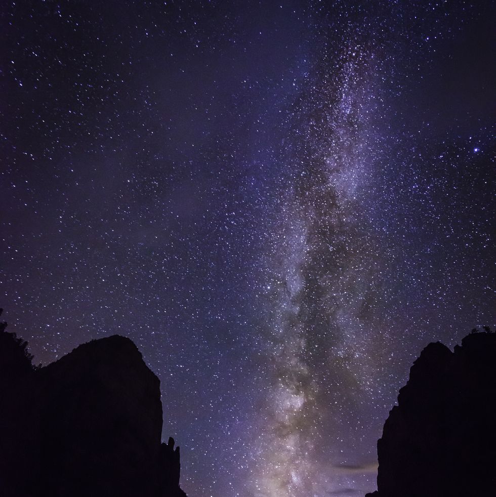 milky way stars over canyon cliffs zion national park utah
