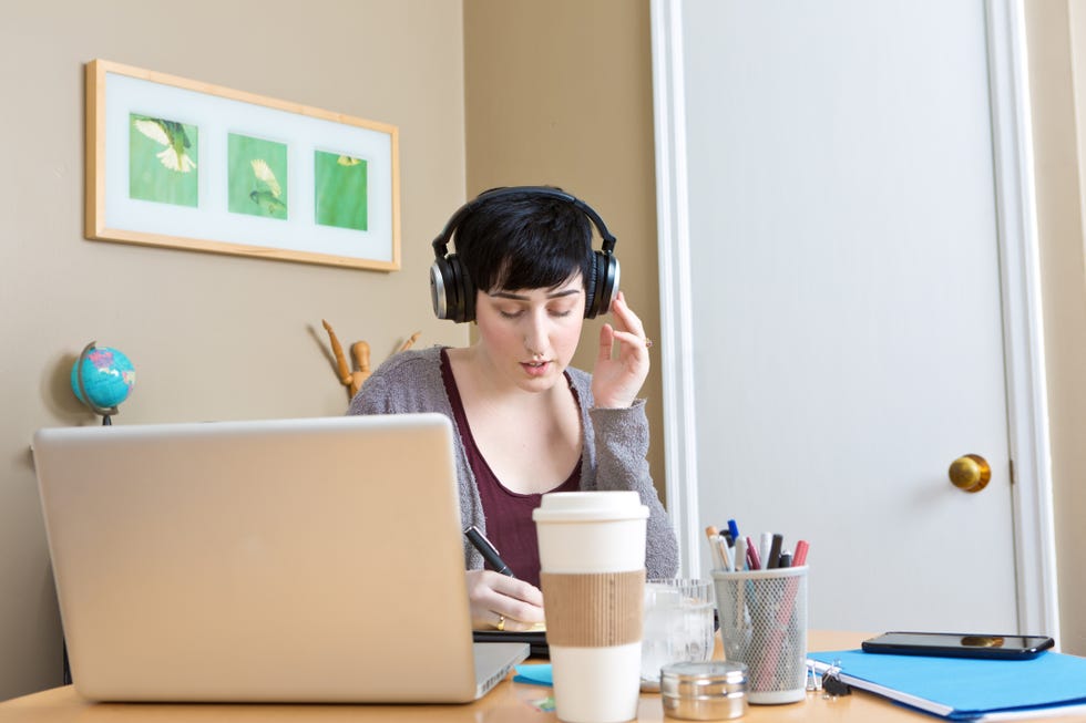 jobs for stay at home moms - Millennial Young Woman Working in Home Office Telecommuting