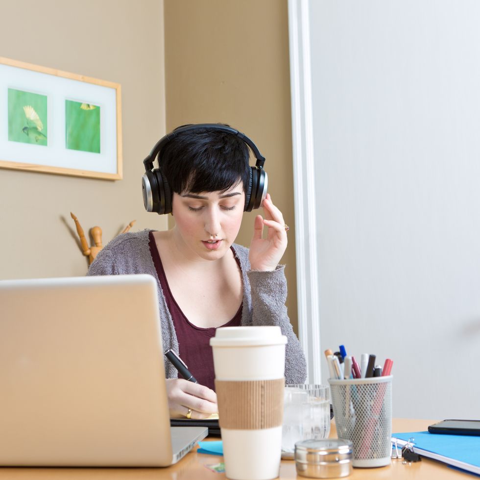 jobs for stay at home moms - Millennial Young Woman Working in Home Office Telecommuting