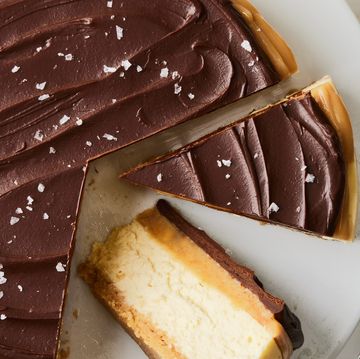 layered shortbread cheesecake covered in chocoalte