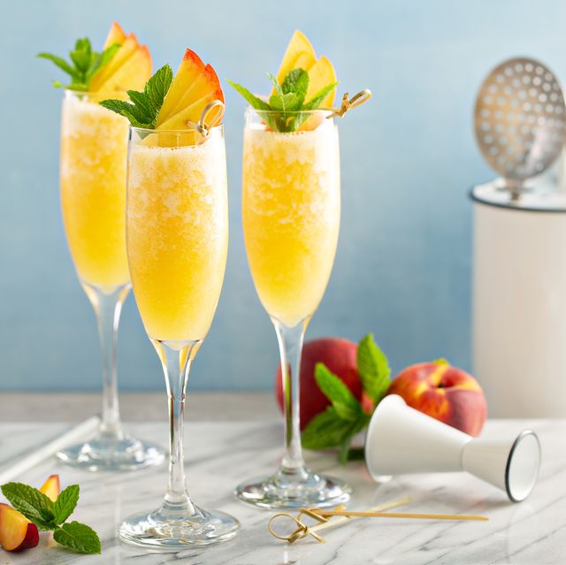 peach mimosa or bellini cocktails for brunch