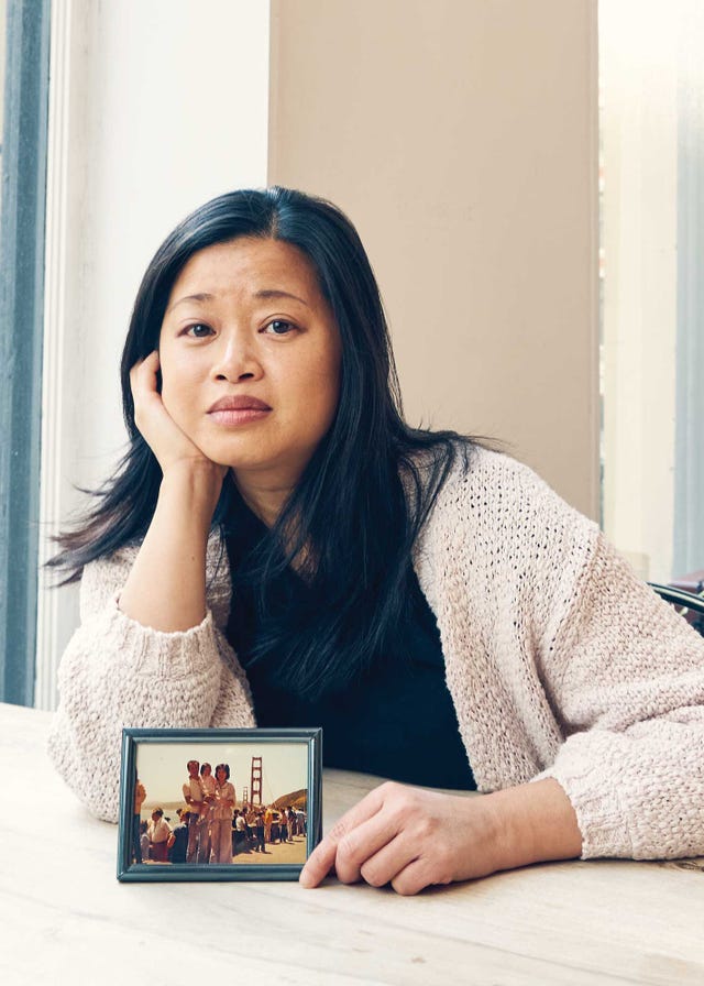 min liao with photo of parents