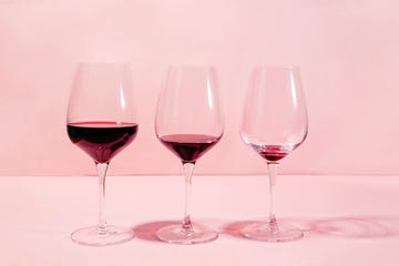 mindful drinking and alcohol cutback concept three glasses with lowering levels of red wine poured,california,united states,usa