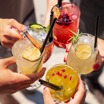 people cheersing cocktails