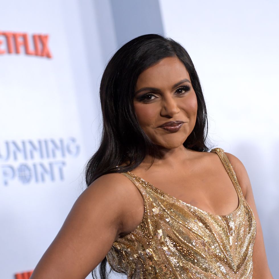 mindy kaling attending a premiere event