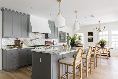 kitchen with grey cabinets and an island