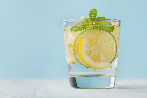 Mineral infused water with limes, lemons, ice and mint leaves